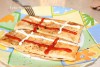 Хрустящие конвертики из лаваша с сыром и помидорами