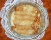 Запеченные блинчики с вишней в сливочном соусе